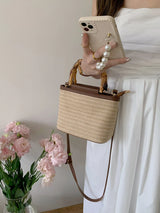 Hand Knitted Women’s Straw Bucket Handbag with Wooden Handle